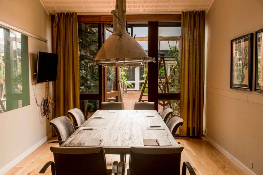Boardroom seating for up to 8 people in the Jollen group room