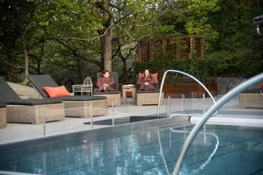 outdoor pool with sun beds  