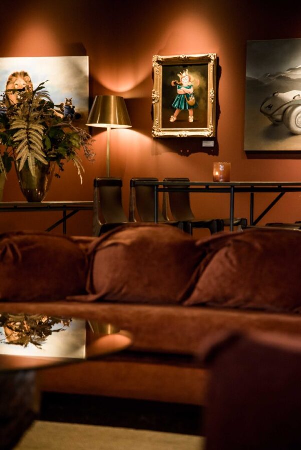 cosy sofa group and paintings on the walls